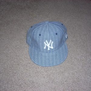 New Era hat.